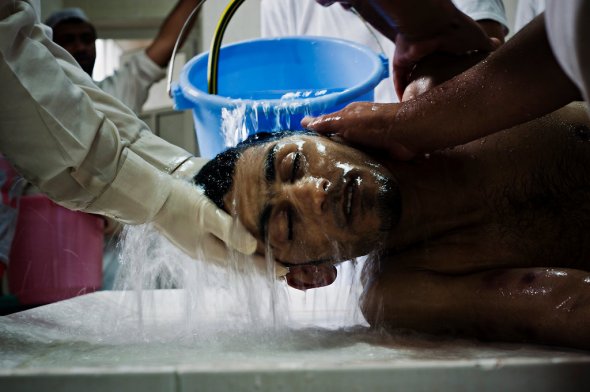 Il corpo di Ahmed Farhan, foto di Andrea Bruce, The New York Times